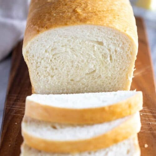 Freshly sliced loaf of classic white bread